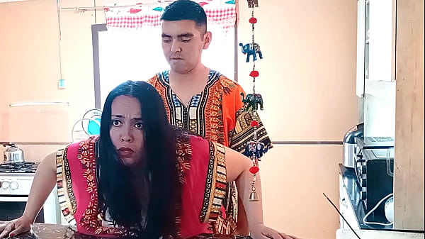 Image The stepmother is fucked from behind in the kitchen