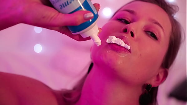 Image Stella Cardo licks cream from her nipples