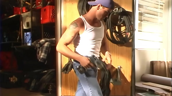 Image A pretty and cute chick with little braids fucks with a young handsome guy in the workshop