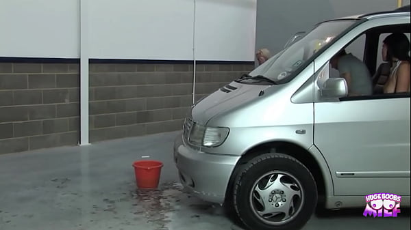 Image He has got two sexy ladies sucking his dick in his new car