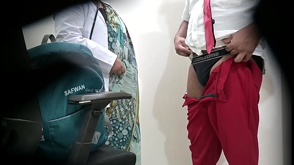 Image Doctor checking patient cock in clinic