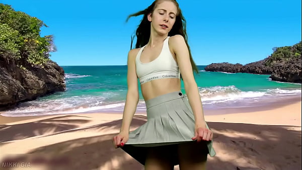 Image She's dancing on the beach without panties