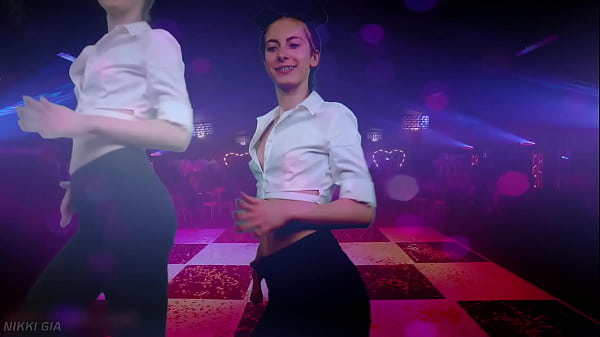 Image Dancing to electronic music in a club