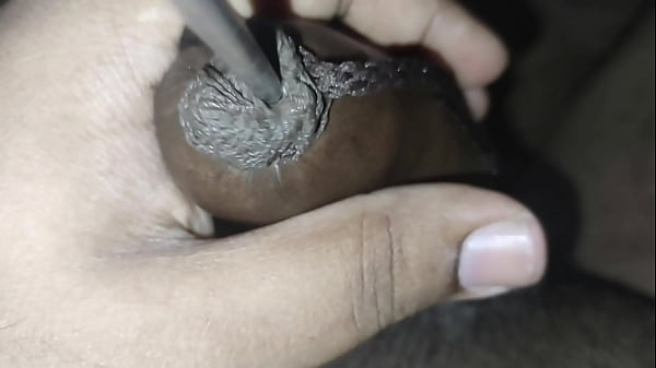 Image PLAY WITH TIED FORESKIN, PEEHOLE AND INSERTING ROD INTO DICK TIP