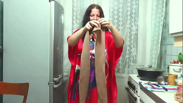 Image A MILF pees near a Christmas tree and urinates on vintage stockings. Amateur fetish compilation. PAWG.