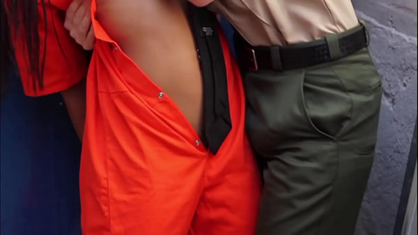 Image Female prison gaurd has her with with black female inmate