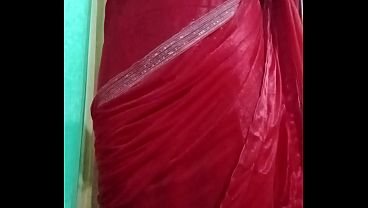 Image Indian Gay Crossdresser Bottom Gaurisissy pressing her big boobs and feeling horny in red saree with heavy jwellery