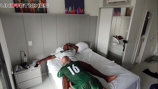 Image Players having sex in a hotel room.