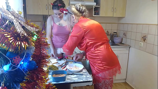 Image Erotic New Year's Eve cooking in a thong and beautiful lingerie.