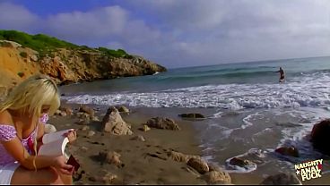 Image Slutty big tits blonde gets horny on the beach and fuck her boyfriends big cock.