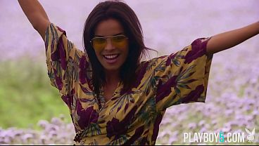 Image Curvy European MILF reveals everything in an outdoor striptease