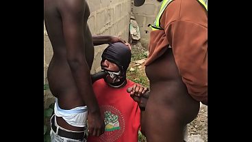 Image Step Dad and step son and friend giving them blowjob behind a fence wall