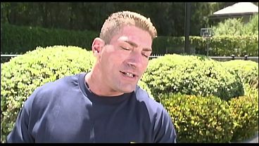 Image A cute blonde chick fucked hard by an older, muscular man in the garden pool