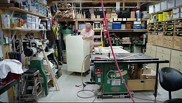 Image Naked Handyman Building Shelves
