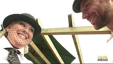 Image Beautiful weather Outdoor makes for a perfect anal threesome with the curvy blonde milf with big tits