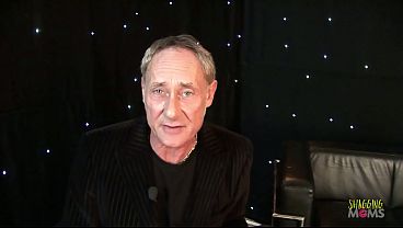 Image In this show the blonde milf with big boobs gets into a threesome with the host and guest