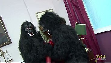 Image Alleged rabbit thief milf gets disciplined by having group sex with men in monkey outfits and the blondie