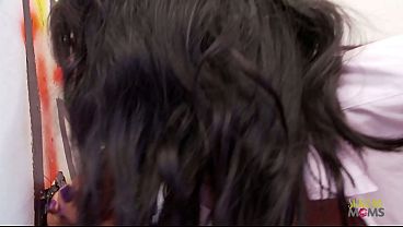 Image Giving a blowjob in the gloryhole is not enough for the brunette milf in heels who craves sex