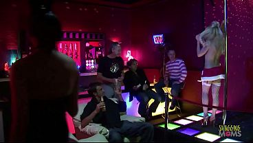 Image Brunette and blonde milf strippers with big tits are eager to have anal group sex with the clients