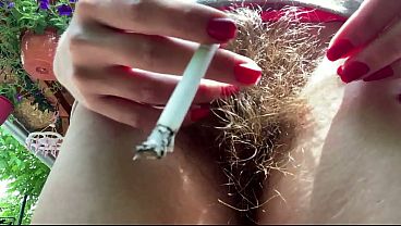 Image hairy bush outdoor two cigarettes