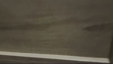 Image Hot and sexy girl with an amazing ass secretly filmed under the door while taking the shower