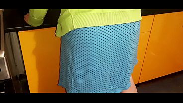 Image The stepmother was cleaning the kitchen and accidentally showed her pussy.