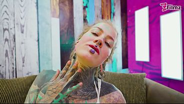 Image Tattooed ANAL queen in white lingerie and high heels masturbating