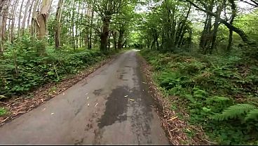 Image I see a girl cycling in the woods and when I go to urinate she helps me by giving me a blowjob in public