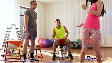 Image Tight young gym teacher takes two cocks at once - Fitness Rooms