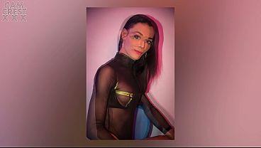 Image TS Aris models her Green Top and Mesh Bodysuit